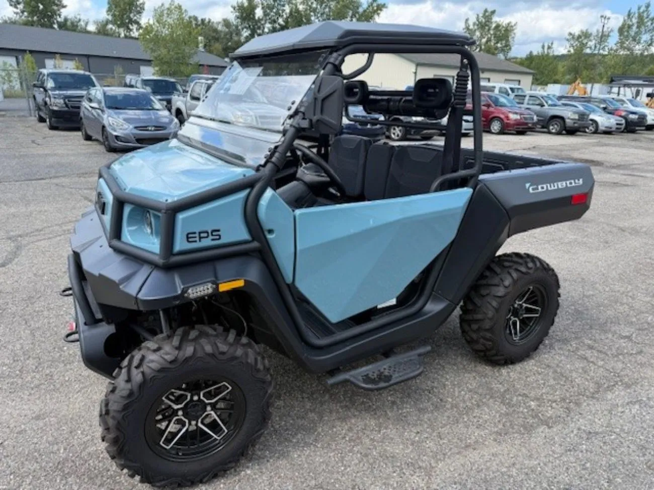 Electric utility vehicle with dump bed for sale